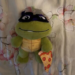 Teenage Mutant Ninja Turtle Tot Donatello Plush Pizza Mutant Mayhem  Figure